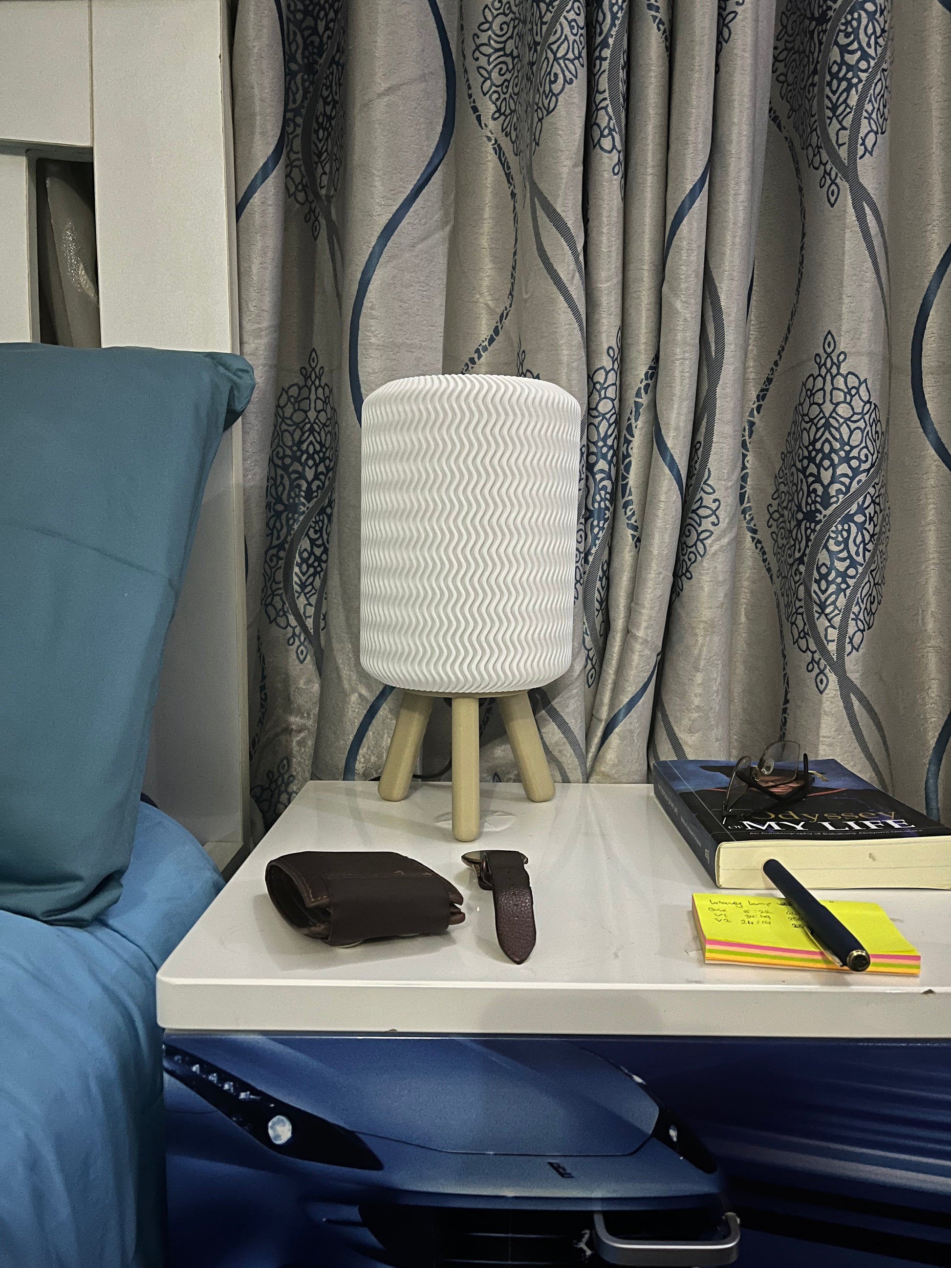 3D printed Hajō bedside/table lamp on a bedside table with lights off