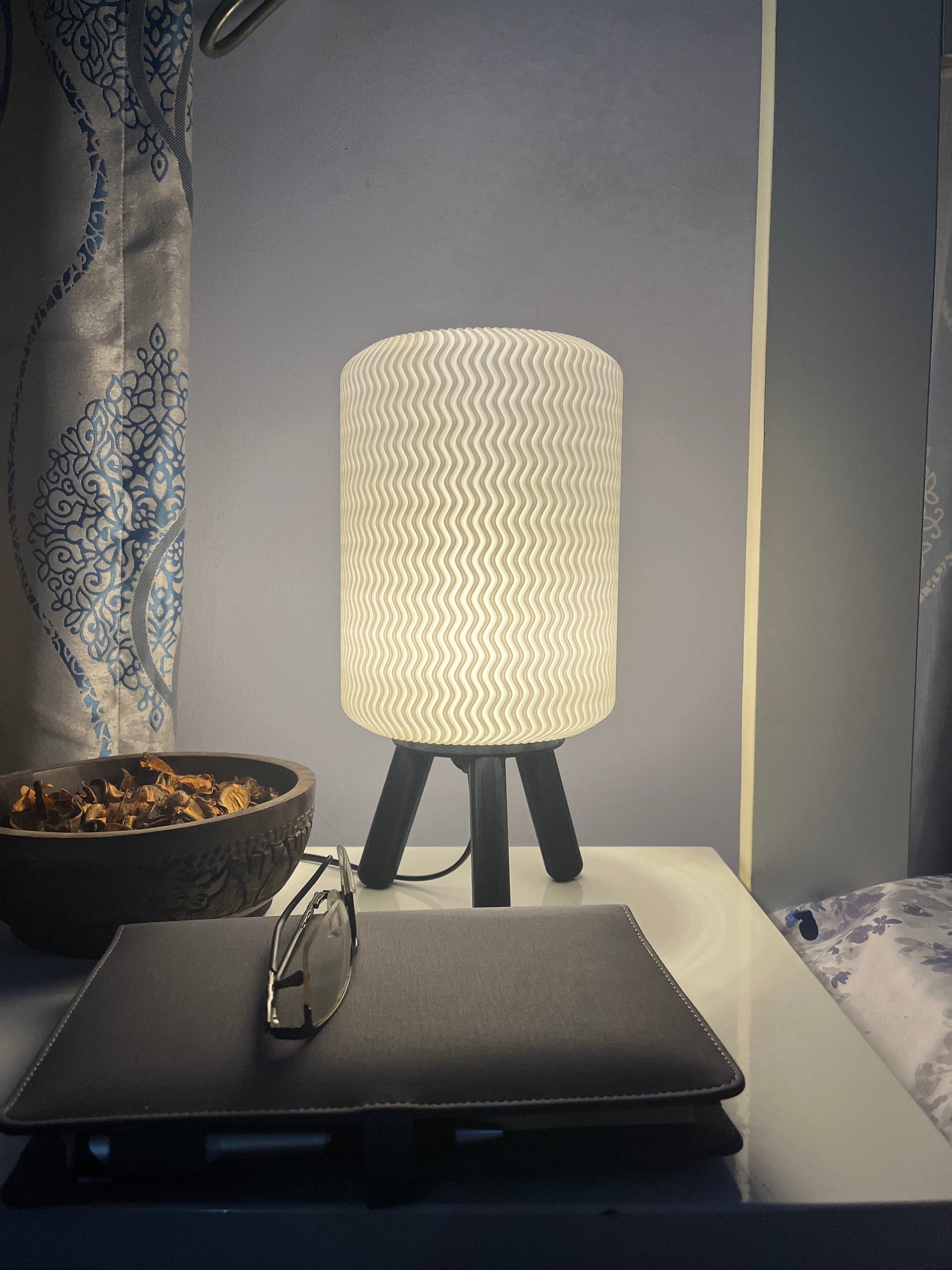 3D printed Black Hajō bedside/table lamp on a bedside table